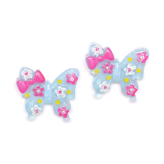 Blue butterfly with flowers and bow clip-on earrings
