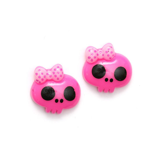 Pink baby doll skull with bow clip-on earrings