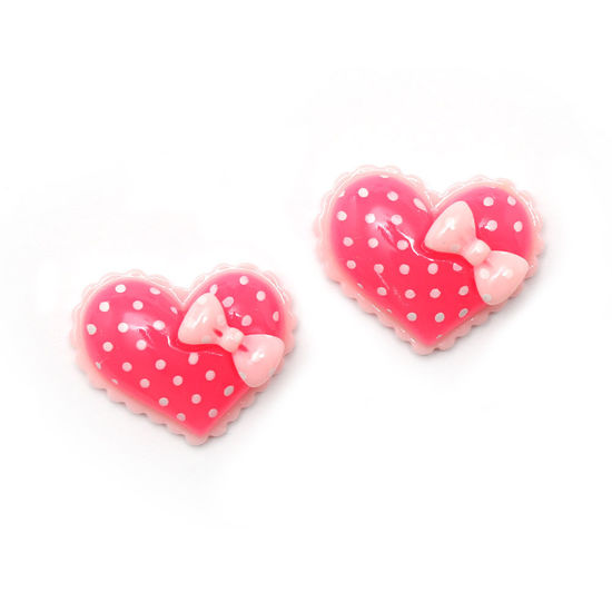 Pink polka dot heart with bow clip-on earrings